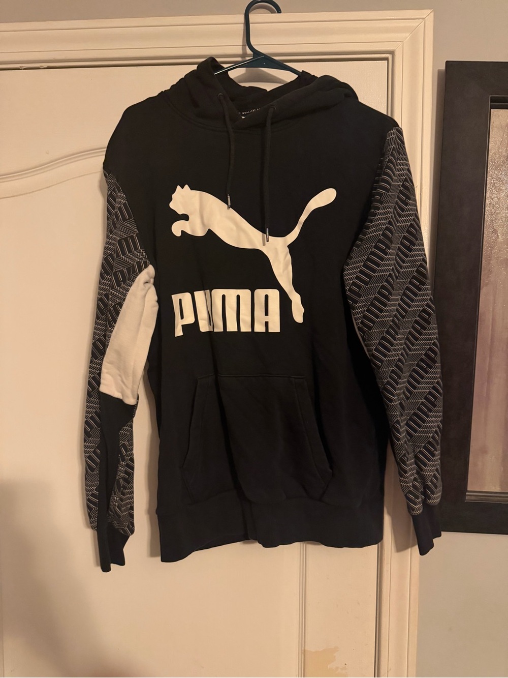 Puma Black Hoodie with White Logo and Patterned Sleeves